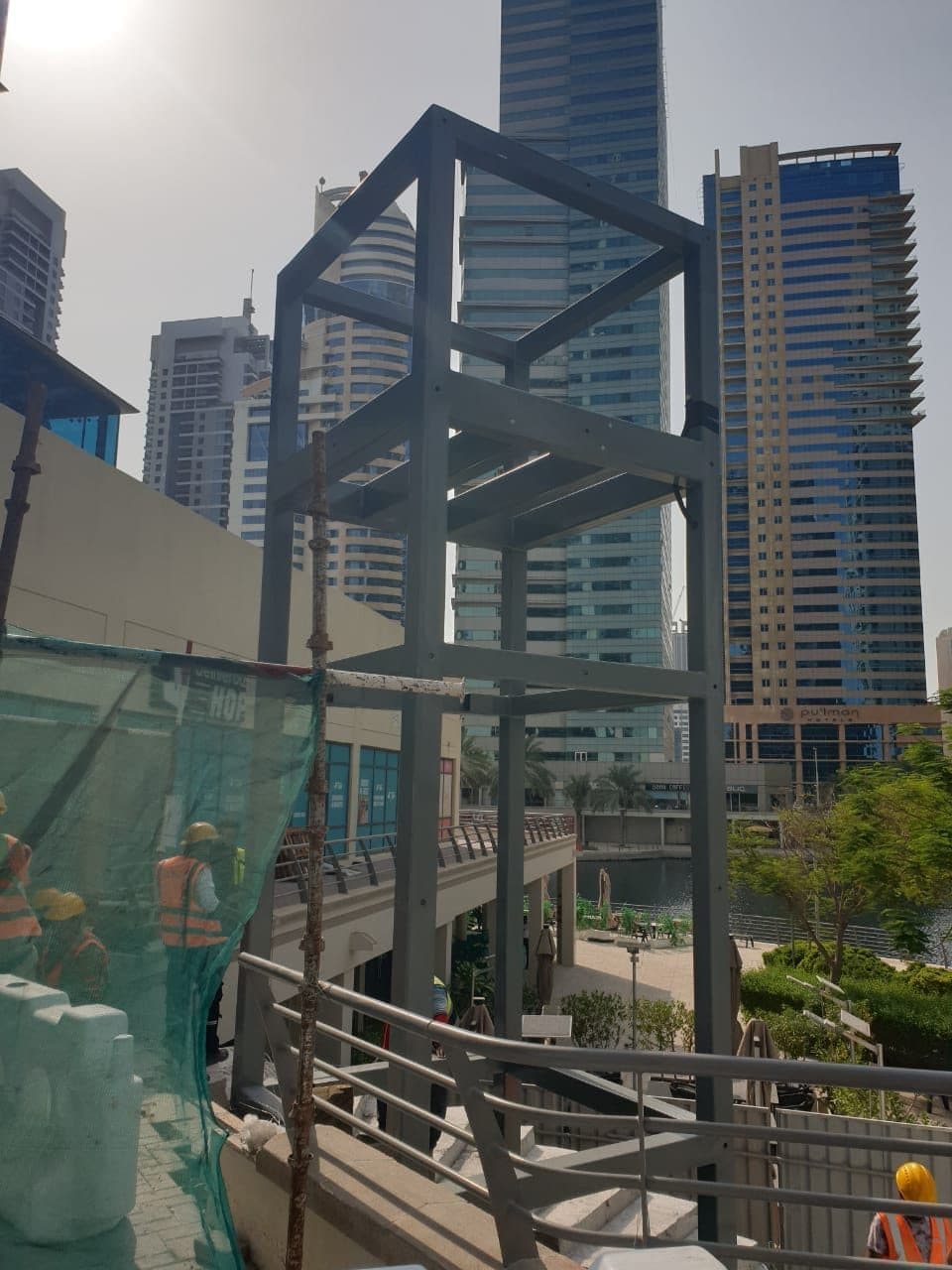 Steel lift structure erected between towers at JLT
