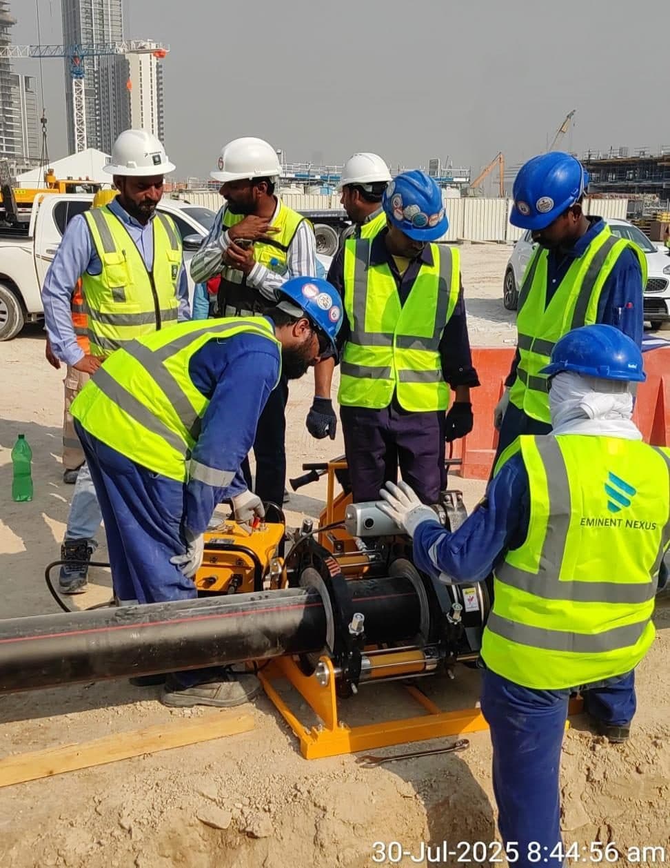 Crew installing hydrant pipework