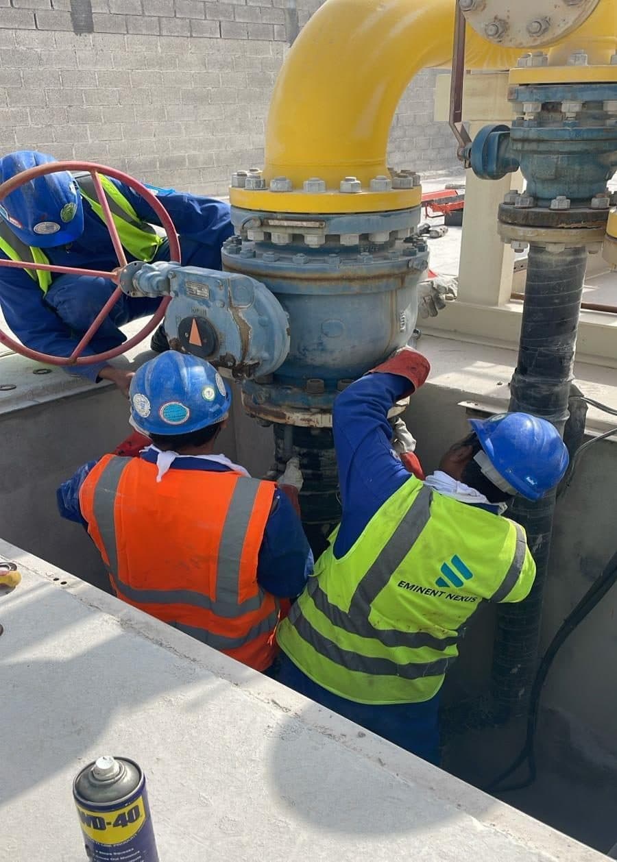Technicians working on gas line valves