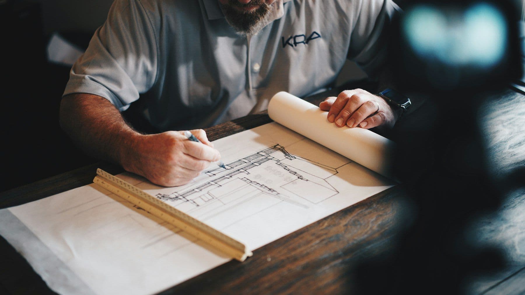 Engineer working over drawings