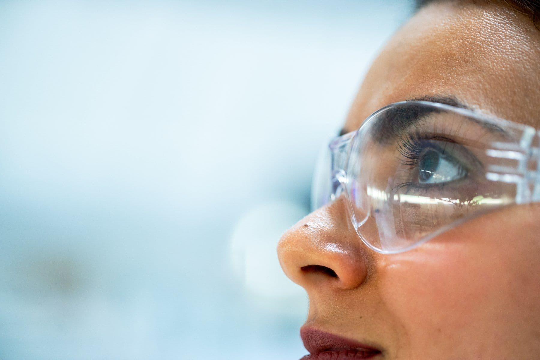 Worker in protective eyewear