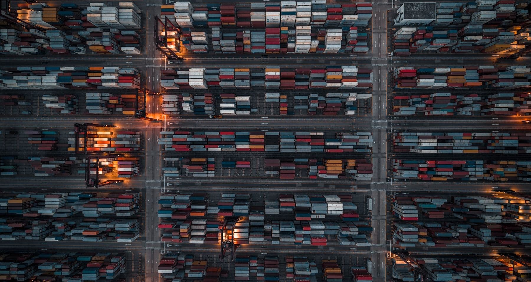 Shipping containers stacked at a terminal